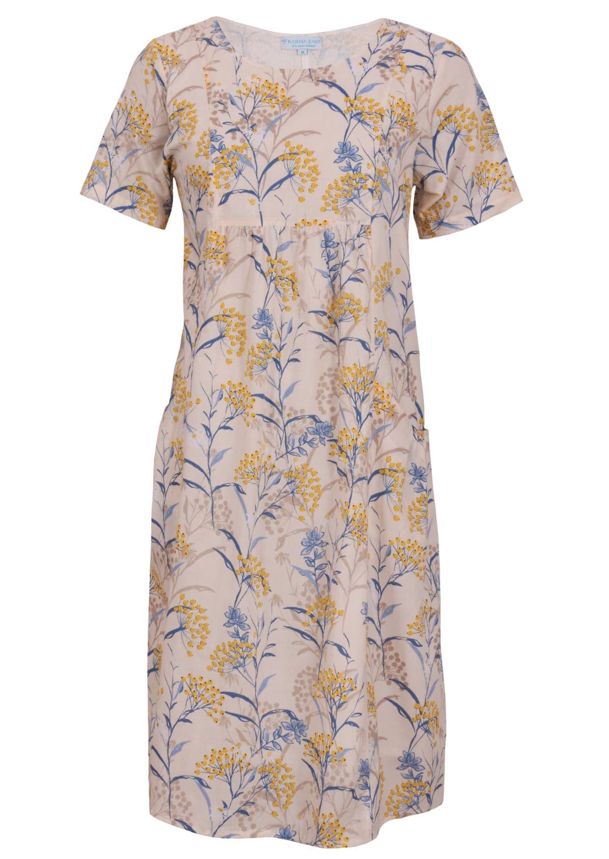 Front view of cotton dress with round neckline in neutral based floral print.