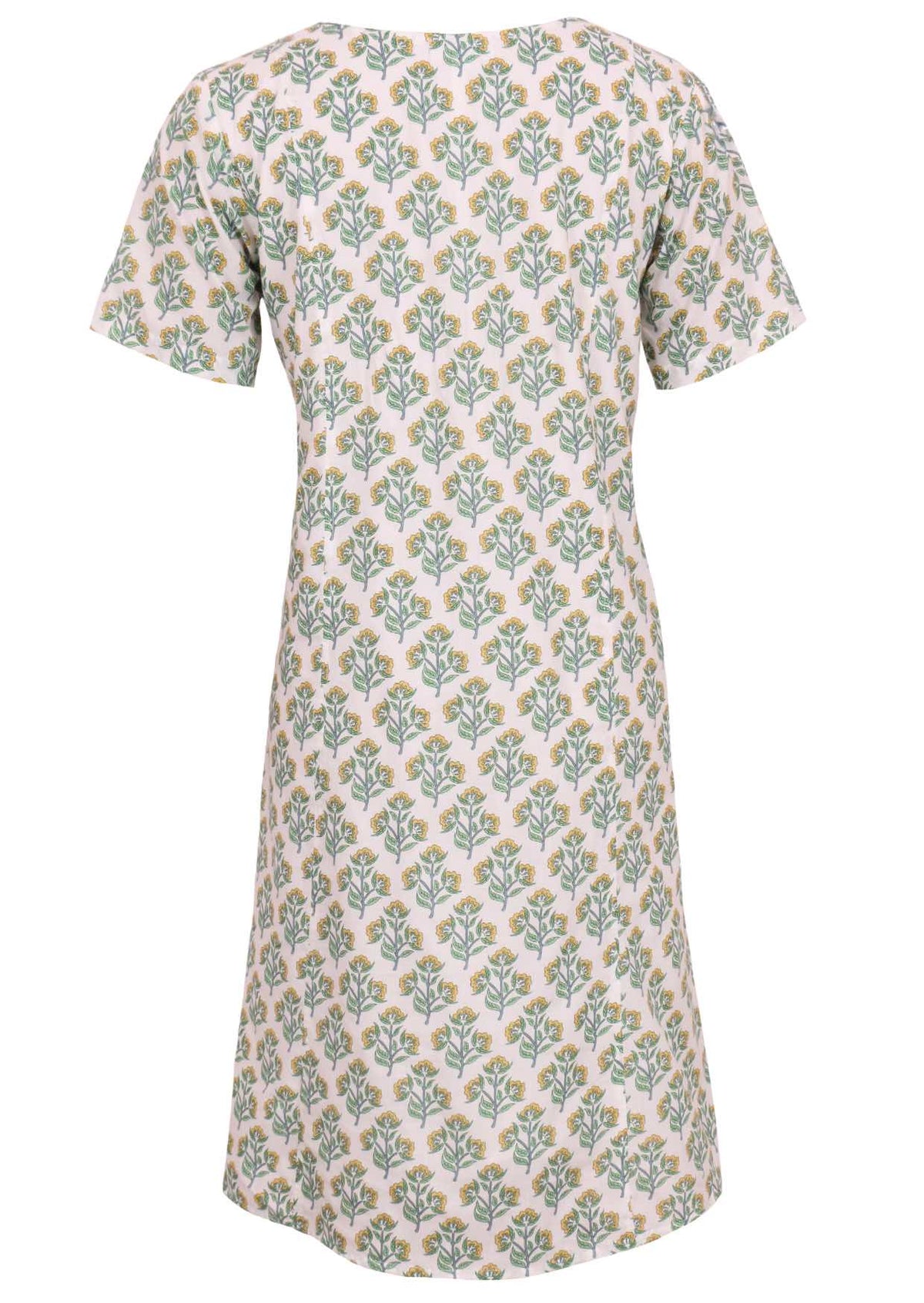 The back side of the dress has a floral pattern, and it has a color of yellow and green on white cotton