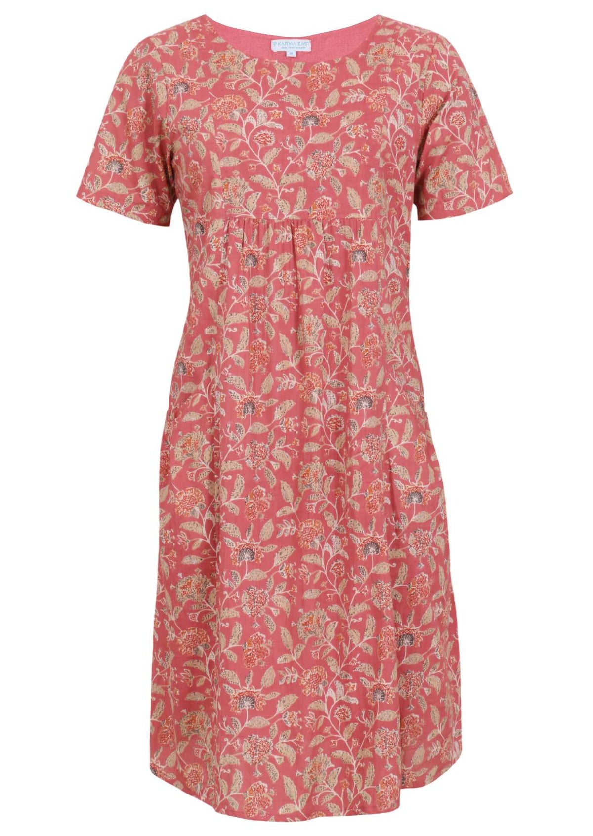 Front view of cotton dress with round neckline in rose pink based floral print.