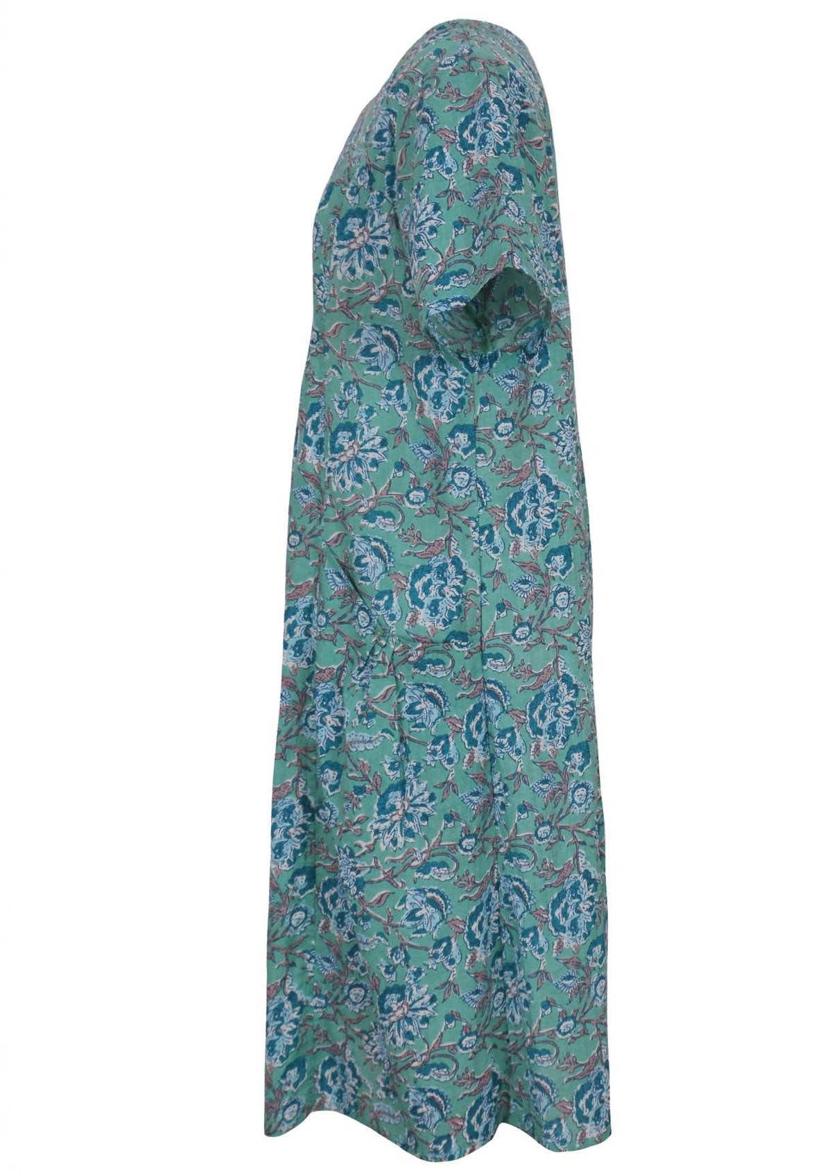 Side view of knee length cotton dress with short sleeves in indian floral print.