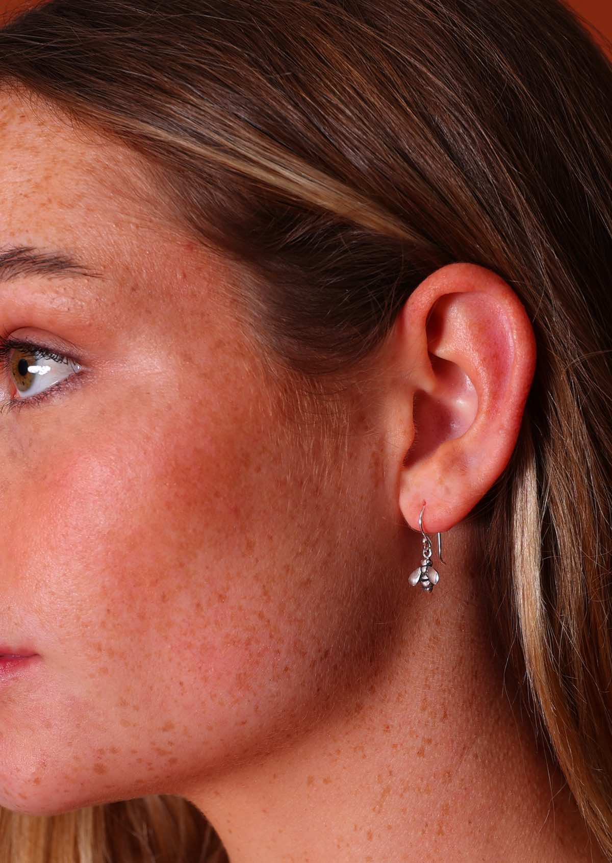 sterling silver little bee earrings on hook