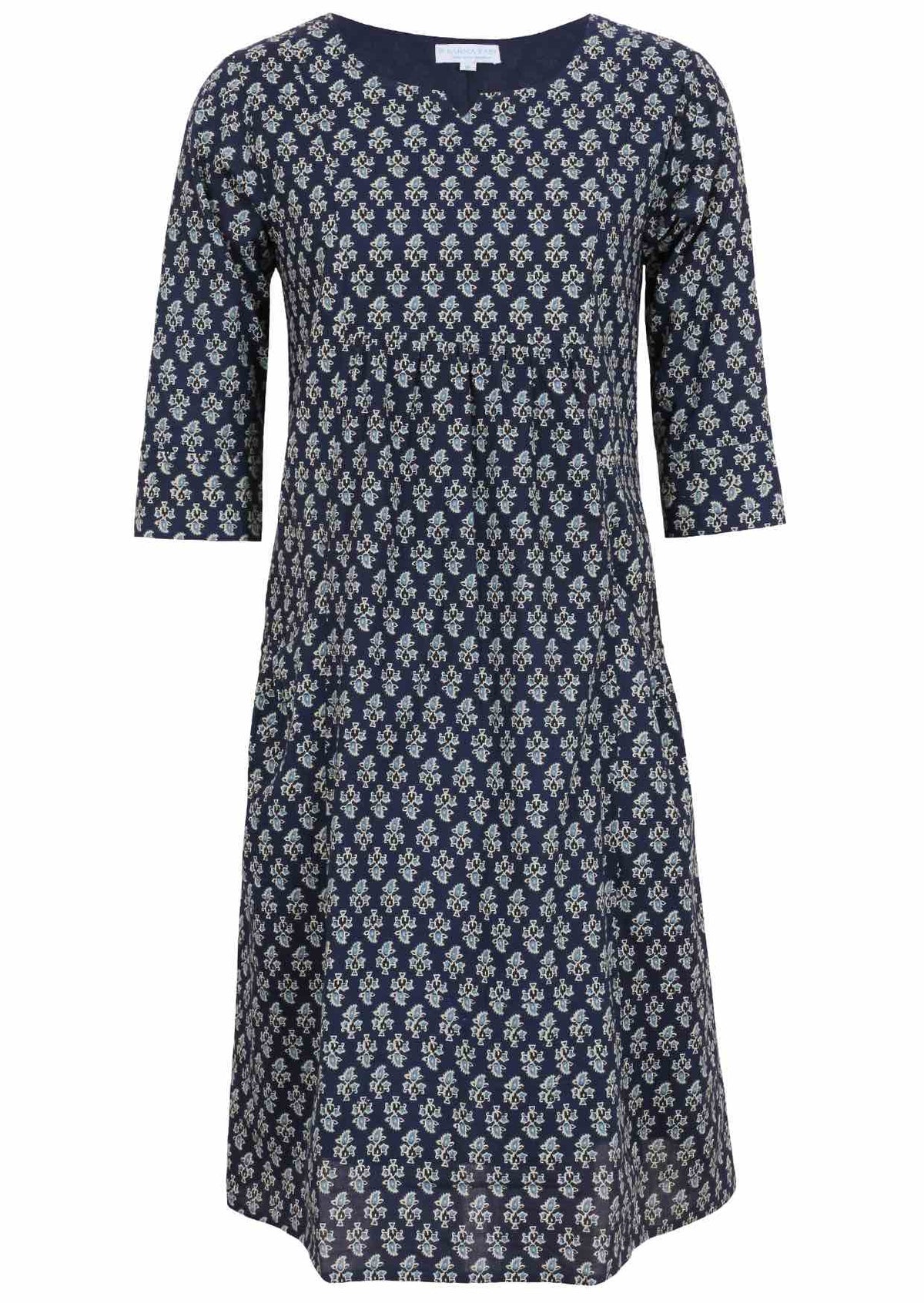 Relaxed fit below knee length cotton dress with 3/4 sleeves, pockets and round neckline.