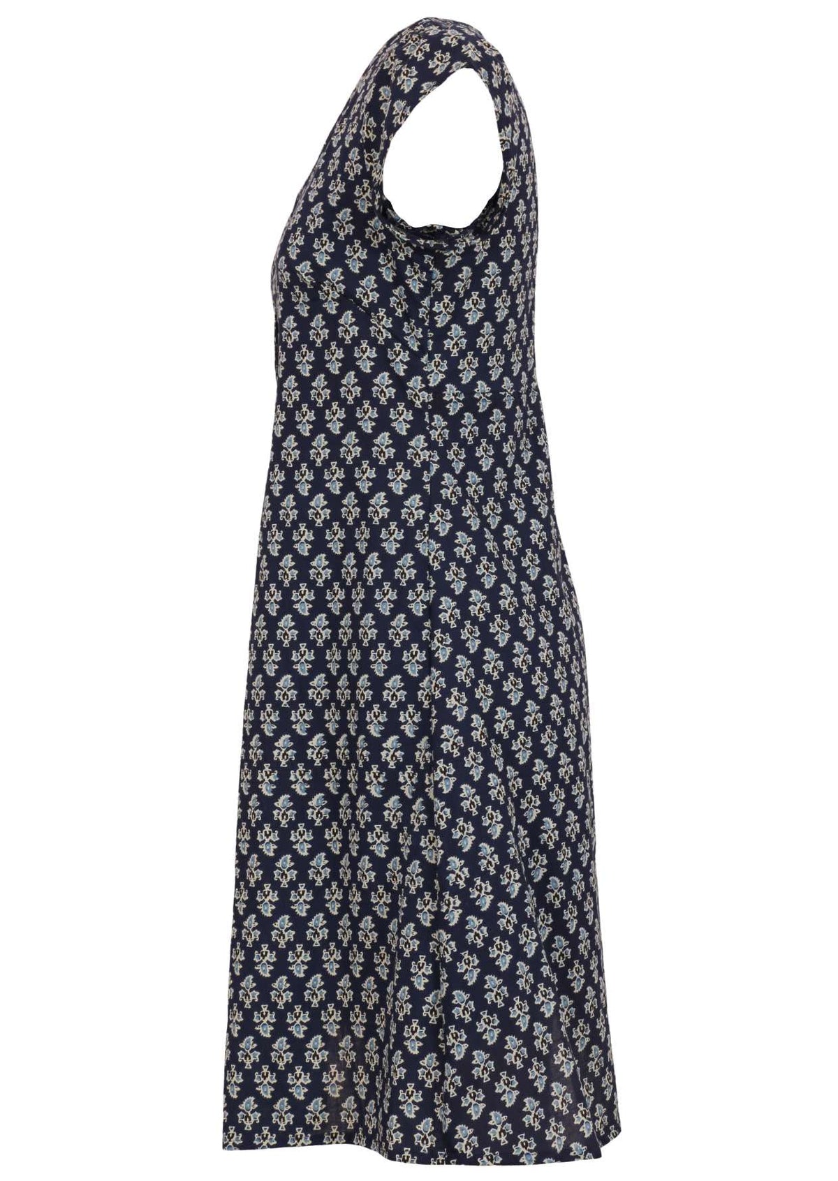 Side view of 100% cotton knee length navy blue floral print dress with cap sleeves, round neckline and fitted bodice