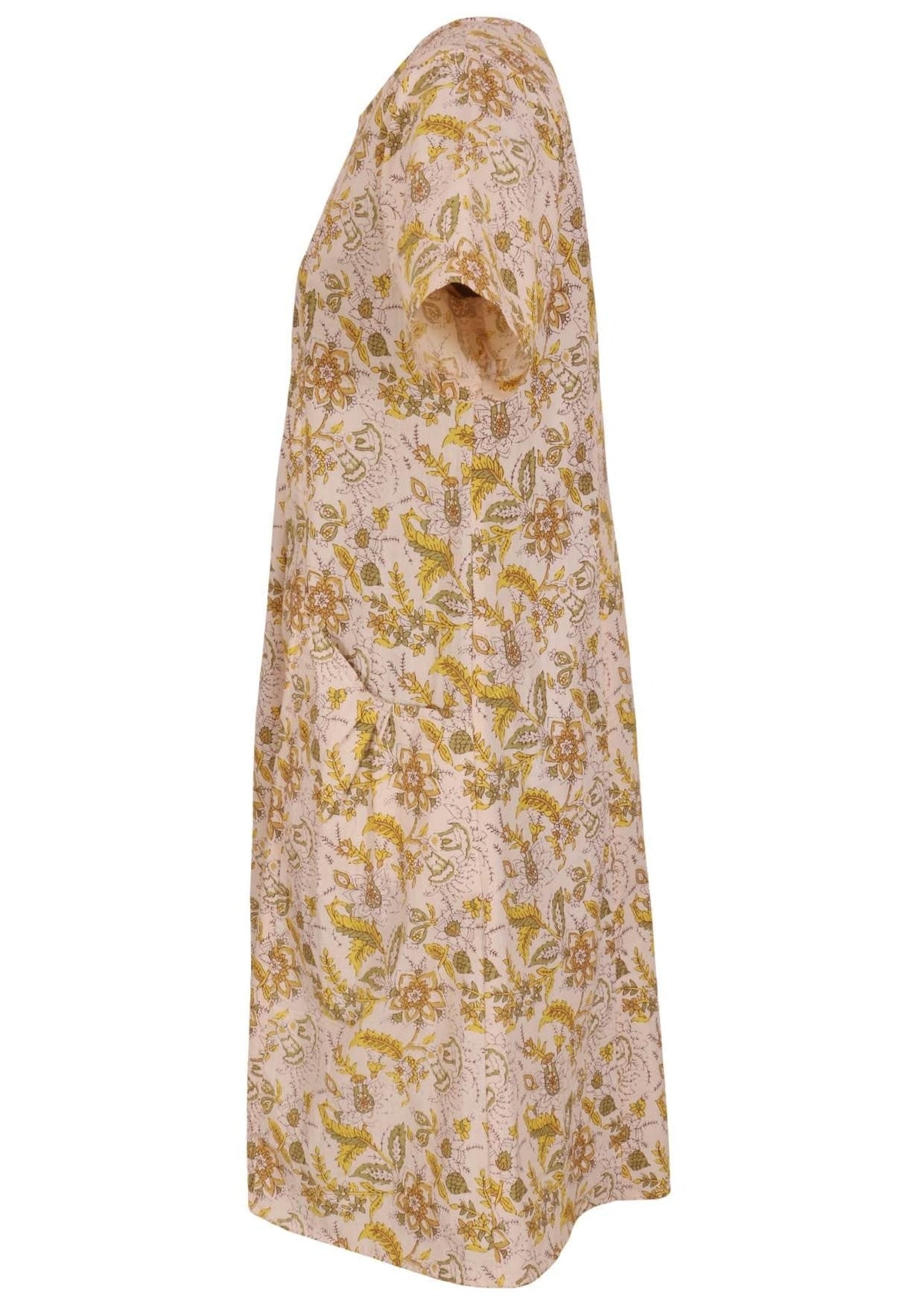 Side view of cotton dress with round neckline and short sleeves in cream based floral print.
