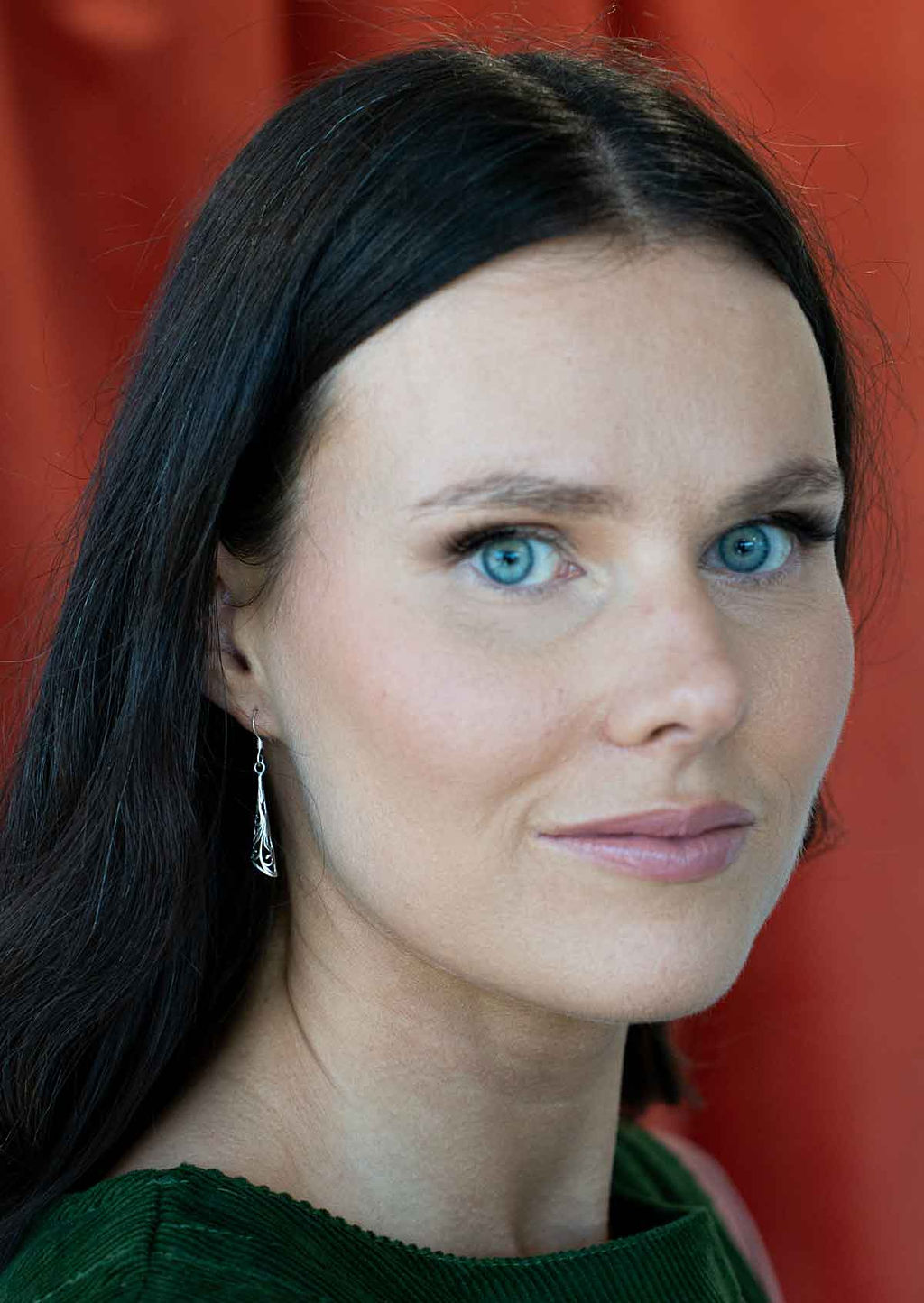 woman wearing silver filigree drop earring 92.5 silver