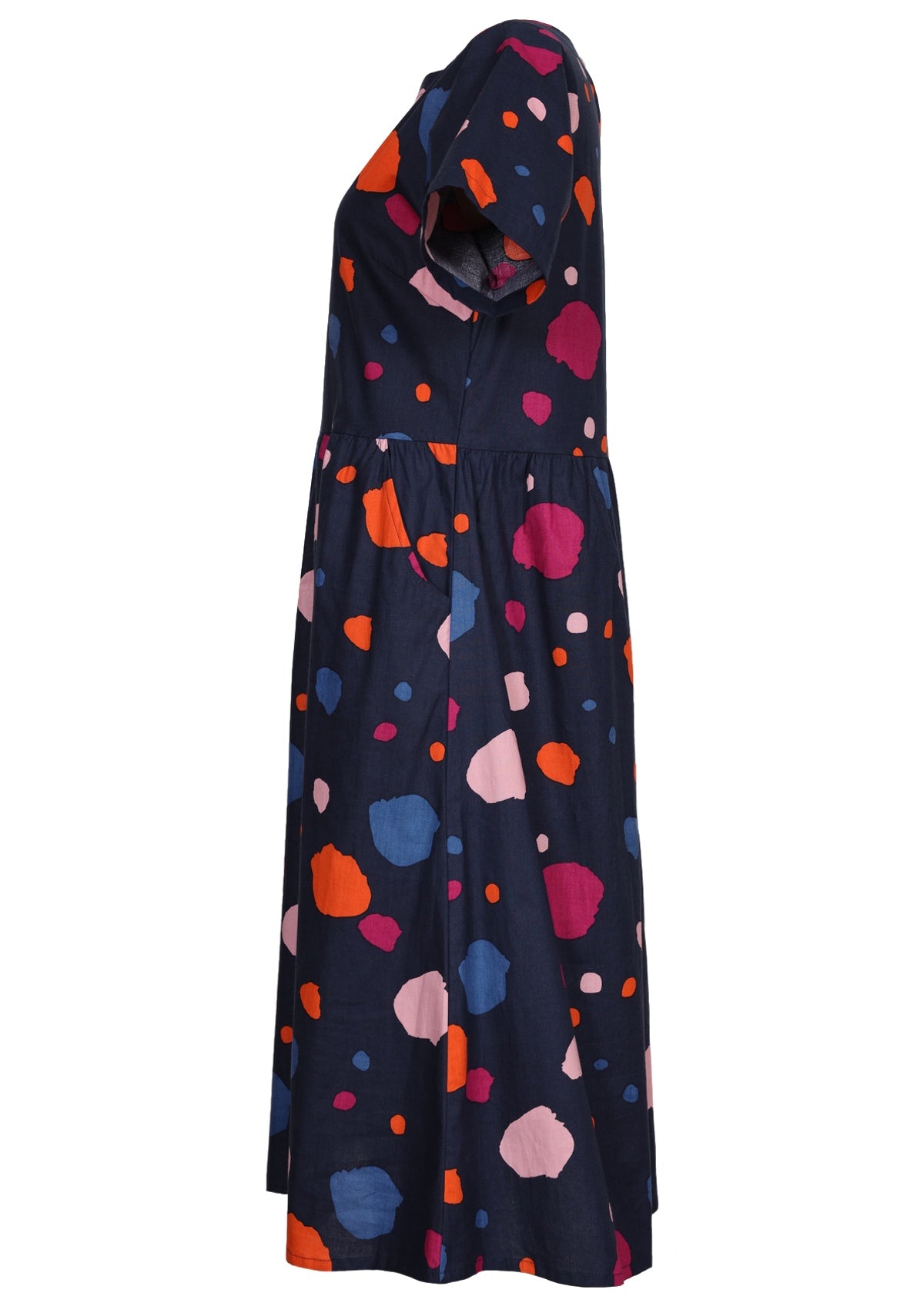 Side of short sleeve above knee length dress with pockets.