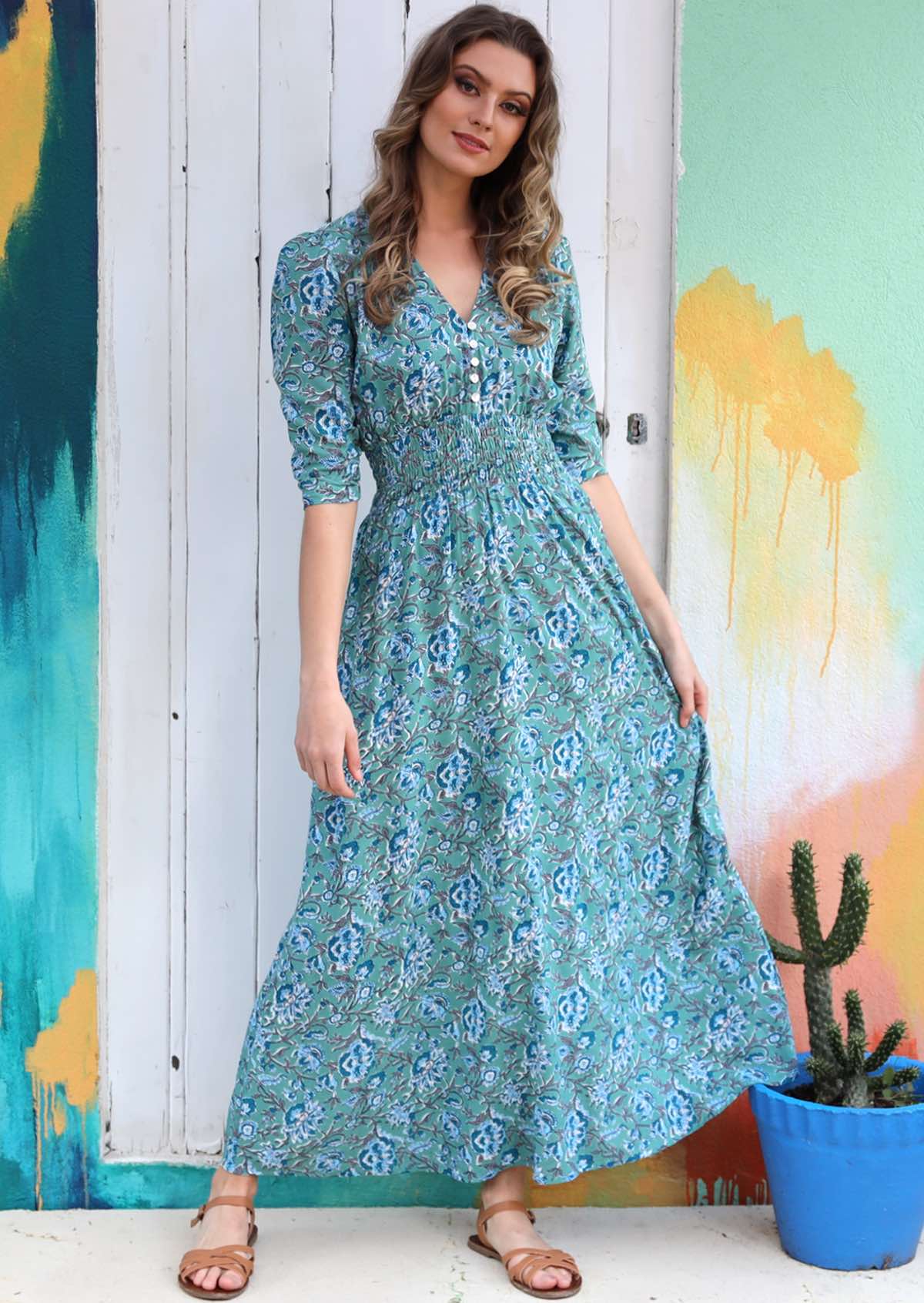 3/4 sleeved 100% rayon maxi dress in aqua blue based floral print.