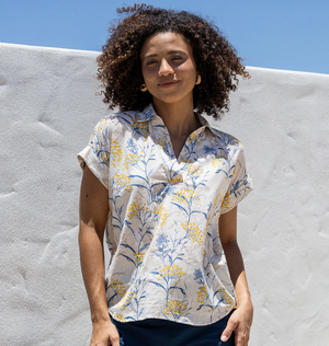 woman wearing black cotton top with round neck and cap sleeve