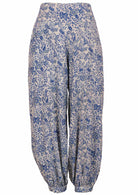 White based blue floral print harem pants with buttoned ankle