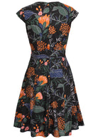 Back view of a floral print retro dress with cap sleeves, fuller skirt and central back zipper.