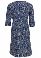 Back mannequin photo of 3/4 sleeve cotton dress that sits over knee