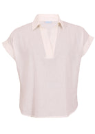 100% cotton, loose fit shirt style top in natural white with folded cuff sleeves, a collar and V-neckline