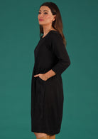 ruching from waistline black dress