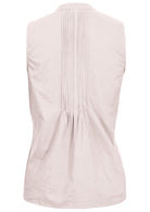 Back view of 100% cotton white sleeveless summer top with high round mandarin collar and small decorative pleats at center of the back