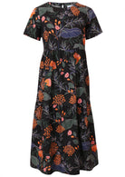 100% cotton midi length dress in black with short sleeves, high round neckline and three tiered skirt