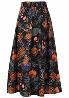 100% cotton button-through long skirt with box pleats, pockets, belt loops and elastic at the back waist