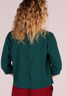 Double cotton top in deep teal with decorative buttons centre back