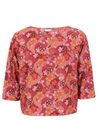 Japanese-style print cotton top in pink, maroon, brown, peach, and khaki tones with round neckline.