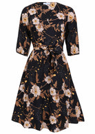 100% cotton, over the knee length wrap dress with 3/4 sleeves and pockets