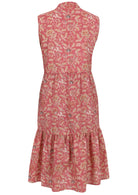 Back view of sleeveless, below knee length cotton dress with two tiered skirt in rose pink based vintage style floral print 
