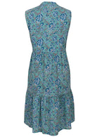 Sleeveless tiered cotton dress with blue and grey floral print on an aqua base