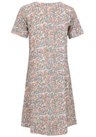 Back view of cotton dress with round neckline in white based floral print. 