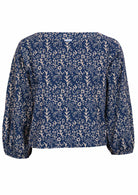 Bishop sleeve top with boat neckline mannequin front view