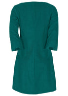 Back photo of teal corduroy A-line dress with 3/4 sleeves with detailed cuff