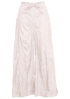 100% cotton wide leg pants in natural white with drawstring waist tie.