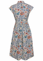 Back view of white based floral print cotton cap sleeves dress.
