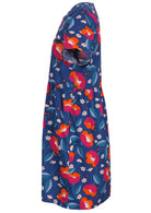 Side view of loose fitting cotton dress in royal blue with short sleeves and hidden side pockets 