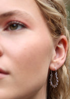 Gorgeous silver decorative hoop earrings