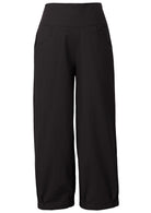 Relaxed fit black cotton pants with pockets, side zipper and wide legs that taper at pleated ankles