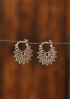 Sterling silver starburst earrings with hinged clasp