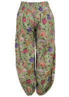 Green based multi-coloured floral print cotton harem pants with elasticated back waistband.