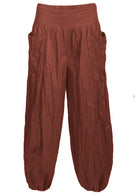 Rust shade loose fit 100% cotton pants with wide flat front waistband and pockets