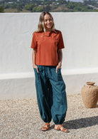 Pilot Pants high-mid waist waistband elasticated back flat front loose fitted leg elasticated at ankles front pockets 100% cotton light weight deep teal