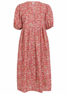 Dusky pink floral print cotton midi length button through dress with voluminous sleeves and V-neckline