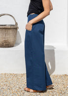 100 percent cotton women's wide leg pants in dark sea blue with pockets and side zipper