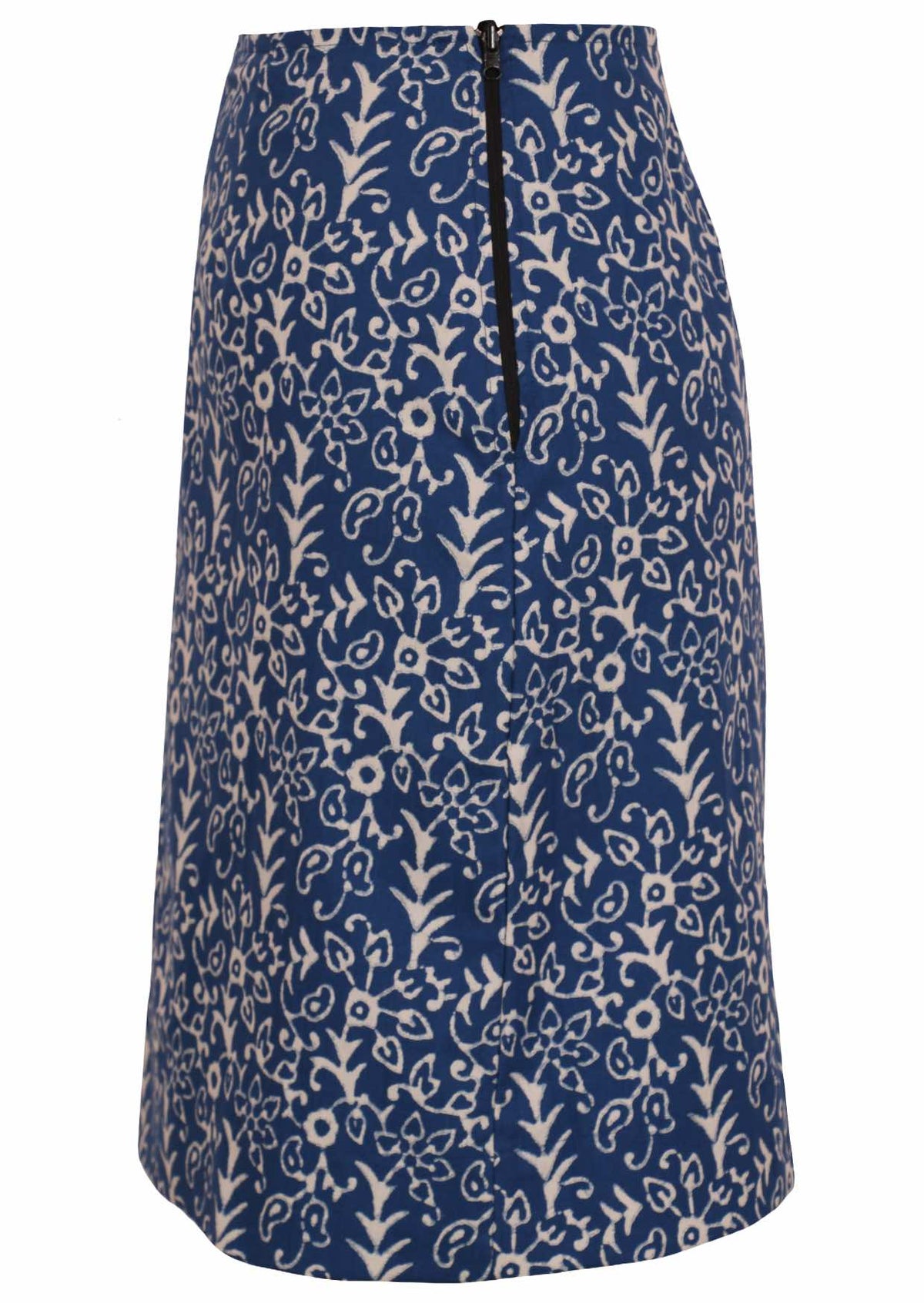 Side image of midlength cotton reversible skirt in blue based floral print with side zipper.