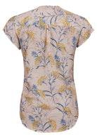 Back view of neutral based floral print 100% cotton top on a white background.