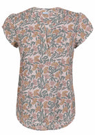 White based floral print cotton top with V-neckline on a white background.