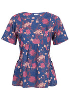 Loose fitting 100% cotton top with short sleeves, round neckline, gathers under the bust and pockets