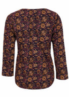 100% cotton top with long sleeves and tiny pleats at the front and back.