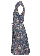 Knee length lightweight shirt style cotton dress with pockets, cap sleeves, small gathers at waist and fabric tie 