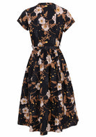 Back view of 50's style cotton midi length dress with a waist tie and cap sleeves