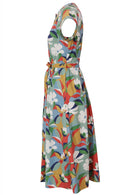 Side view of 50's style cotton button through midi length dress with a waist tie and hidden side pockets