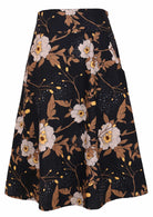 100% cotton black printed mid length A-line skirt with a wide waistband, pockets, and side zipper