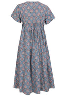 Back view of powder blue based floral print V-neck cotton dress with pockets.