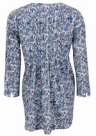 White based blue floral print cotton button through shirt with long sleeves, and pin tucks across the bodice, front and back